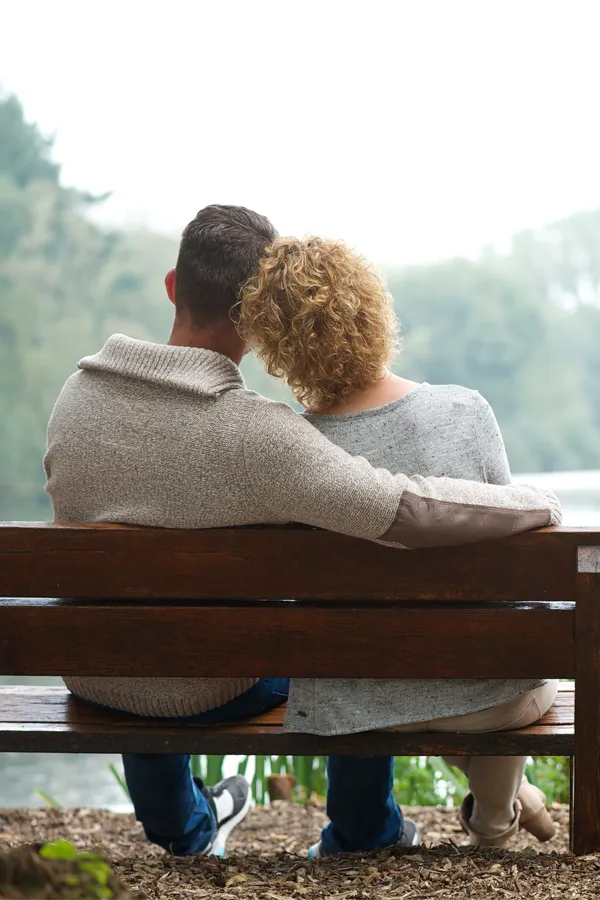 Low-Dose-Allergen-LDA-Treatment A couple on a bench sit arm in arm looking out at a calm pond. Get Low Dose Allergen (LDA) Immunotherapy from Allen Green, M.D. of Center for Optimum Health in Los Angeles.