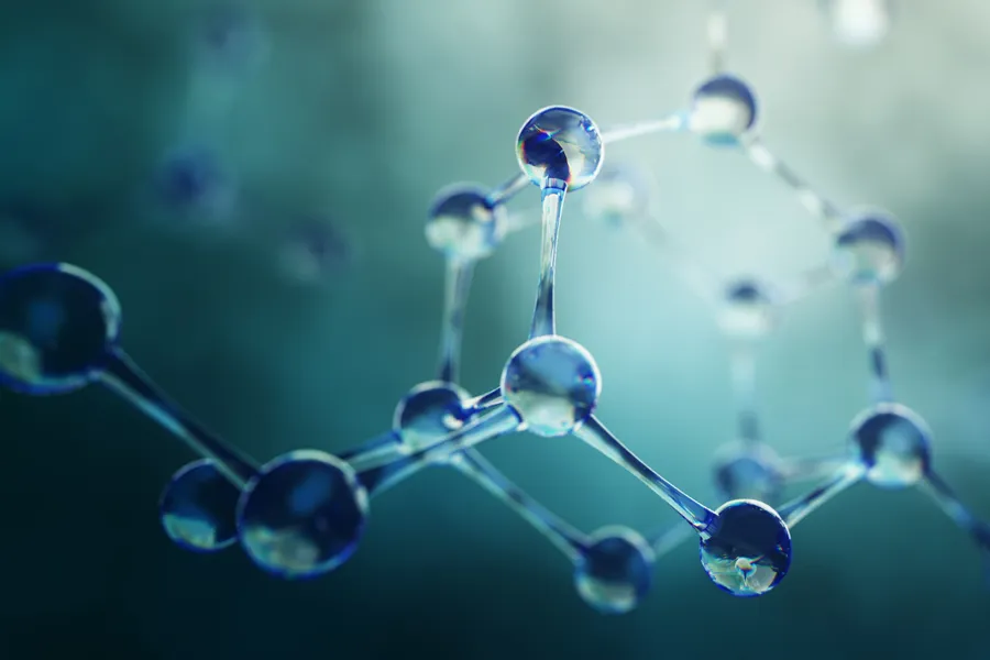 A 3D illustration of molecules in blue and green tones. Get ozone therapy from Allen Green, M.D. of Center for Optimum Health in Los Angeles.